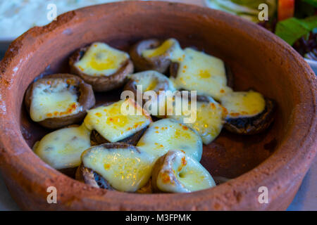 mushrooms baked with cheddar cheese Stock Photo