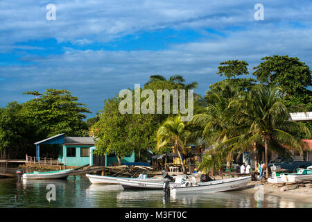 Fishing boats on the beach, Placencia Belize Stock Photo