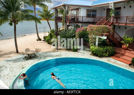 Swimming pool at Chabil Mar beach front luxury hotel Placencia Belize Central America Stock Photo