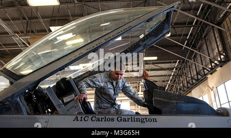 Senior Airman Eric Medina, 309th Aircraft Maintenance Unit dedicated crew chief, performs pre-flight inspections on an F-16 Fighting Falcon at Luke Air Force Base, Ariz., Jan. 25, 2018. DCCs are technical maintenance experts of their assigned aircraft and play a vital role in the success of Luke’s mission. (U.S. Air Force Stock Photo