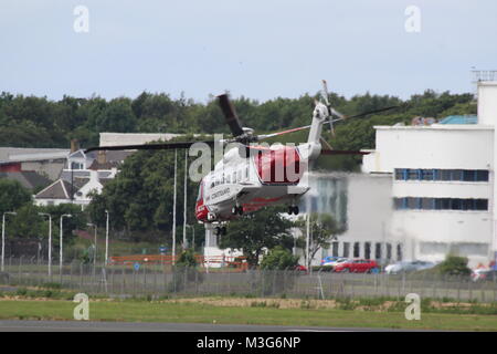 G-MCGG, a Sikorsky S-92A operated by Bristow Helicopters on behalf of HM Coastguard, departs from Prestwick Airport in Ayrshire. Stock Photo