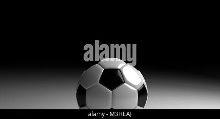 Soccer ball on white surface with a black background Stock Photo