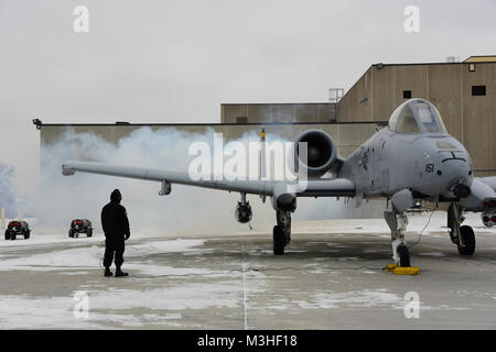 U.S. Air Force Staff Sgt. Andre Gonzales, A-10C Thunderbolt II Demonstration Team avionics systems craftsman, conducts startup procedures with Capt. Cody Wilton, A-10 Demo Team commander, prior to a flight at Minneapolis-St. Paul Air Reserve Station, Minn., Feb. 5, 2018. The A-10 Demo Team visited Minneapolis to support a Air Force Heritage Flight flyover for Super Bowl 52. (U.S. Air Force Stock Photo