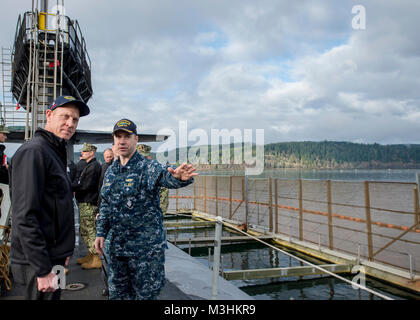 BANGOR, Wash. (Feb. 9, 2018) Cmdr. Jeffery Yackeren, commanding officer USS Alabama (SSBN 731) gives a tour to Deputy Secretary of Defense Patrick M. Shanahan (left). Shanahan also visited Commander, Submarine Group 9 and other facilities onboard Naval Base Kistap-Bangor,  Washington highlighting the strategic deterrence mission. Alabama is one of eight ballistic-missile submarines stationed at the base, providing the most survivable leg of the strategic deterrence triad for the United States. (U.S. Navy Stock Photo