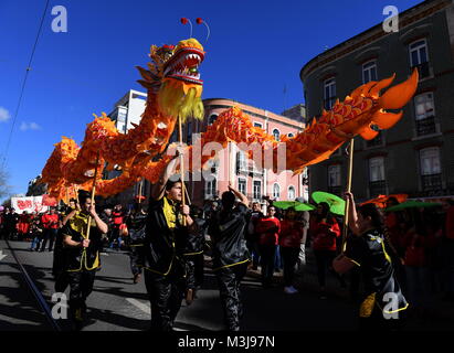 Lisbon. 10th Feb, 2018. Portuguese perform dragon dance during 'Happy Chinese New Year' celebration in Lisbon, capital of Portugal on Feb. 10, 2018. Credit: Zhang Liyun/Xinhua/Alamy Live News Stock Photo