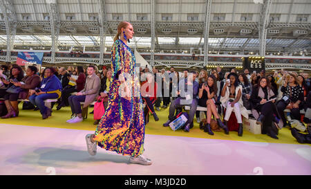 London, UK.  11 February 2018. A model on the main stage catwalk. Pure London, the UK's largest trade buying fashion event for womenswear, menswear, footwear and accessories from emerging and established designers, opens at Kensington Olympia showcasing the latest trends for AW18/19.  Credit: Stephen Chung / Alamy Live News