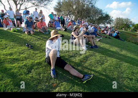 Boca Raton, Florida, USA. 11th Feb, 2018. Golf fans watch the island green on the 15th hole during the final round at the 2018 Boca Raton Championship on the Old Course at Broken Sound in Boca Raton, Florida on February 11, 2018. Credit: Allen Eyestone/The Palm Beach Post/ZUMA Wire/Alamy Live News Stock Photo