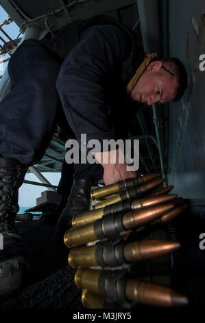 GULF OF THAILAND (Feb. 9, 2018) Gunner's Mate Seaman Michael Norris, from Oakdale, Calif., stores rounds of .50-caliber machine gun ammunition during small craft action team (SCAT) training aboard the amphibious assault ship USS Bonhomme Richard (LHD 6). Bonhomme Richard is operating in the Indo-Asia-Pacific region as part of a regularly scheduled patrol and provides a rapid-response capability in the event of a regional contingency or natural disaster. (U.S. Navy Stock Photo