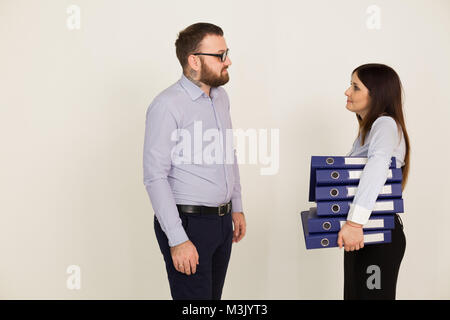 Office workers, a man and woman head Stock Photo