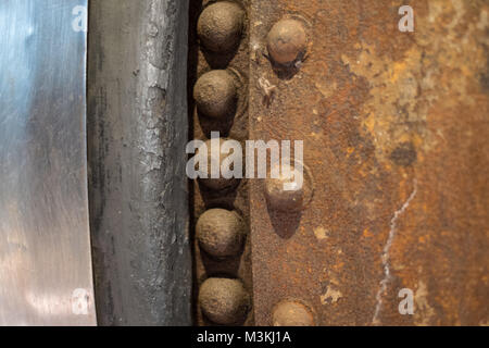rusty metal closeup  - vintage   industrial texture with rivets - Stock Photo