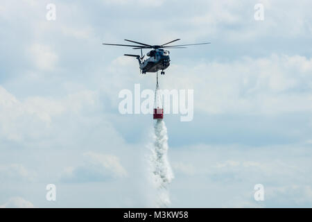 BERLIN, GERMANY - JUNE 02, 2016: Heavy-lift cargo helicopter Sikorsky CH-53 Sea Stallion of the German Army with equipment for fighting fires. Exhibition ILA Berlin Air Show 2016 Stock Photo