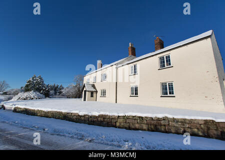 Village of Coddington, England. Picturesque winter view of a rural house, in the Cheshire village of Coddington. Stock Photo