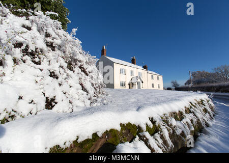 Village of Coddington, England. Picturesque winter view of a rural house, in the Cheshire village of Coddington. Stock Photo