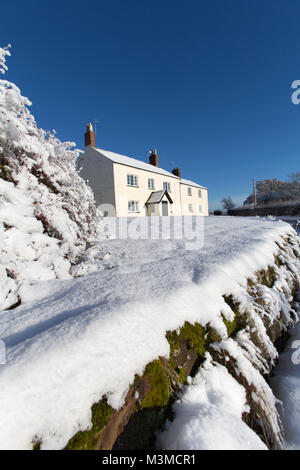 Village of Coddington, England. Picturesque winter view of a rural house, in the Cheshire village of Coddington. Stock Photo