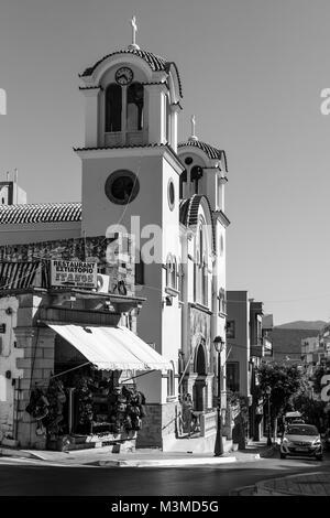 CRETE, GREECE - JULY 11, 2016: The Church of the Holy Trinity of the coastal town of Agios Nikolaos. Black and white. Stock Photo