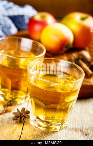 Hot cider with spices in glasses Stock Photo