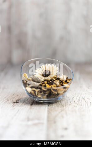 Flower arrangement on wooden desk Stock Photo