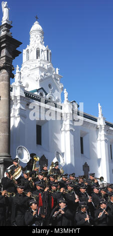 Banda del Cuerpo de Bomberos del DMQ,  Band of the Quito Fire Department, with the motto ‘Abnegacion y disciplina’ play in Plaza Grande on the steps o Stock Photo