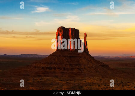 The West Mitten Butte at dusk in Monument Valley Navajo Tribal Park, Arizona. Stock Photo