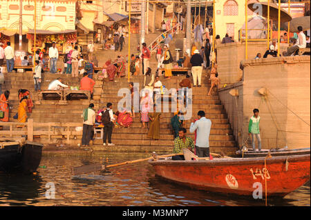 People bath in the river Ganges in Varanasi, India Stock Photo