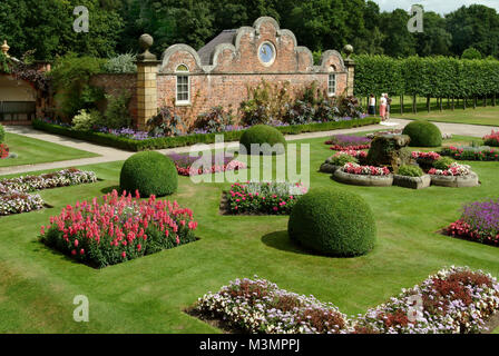 Erddig Hall, A 17th.century stately home, Wrexham, Wales, with it's kitchen and collection of old cars & carriages and the octagonal dovecote Stock Photo