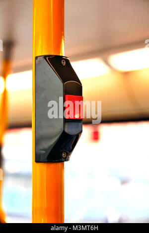 Bell stop button on public transport bus Stock Photo