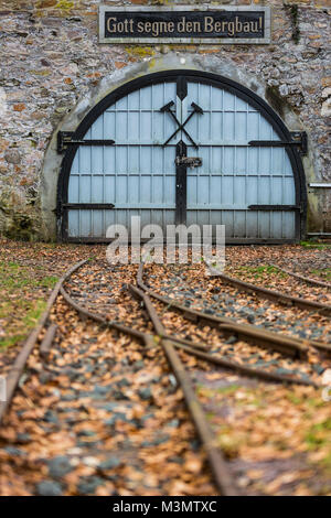 Mine entrance, gate, labeling Gott segne den Bergbau, god bless the mining,  visitor's mine Grube Fortuna, Solms, Germany Stock Photo