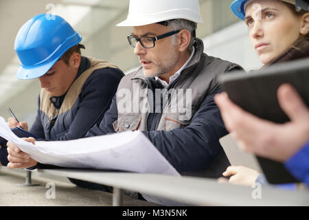 Instructor with young people in engineering training Stock Photo