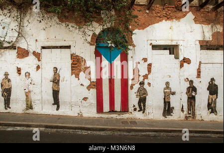 San Juan, Puerto Rico - June 25, 2015: Graffiti and puerto rican flag painted on the door in Old San Juan, Puerto Rico Stock Photo