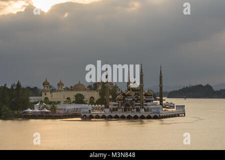 The floating Crystal Mosque or Masjid Kristal in Kuala Terengganu, Malaysia in the river just off of a man made island. Stock Photo