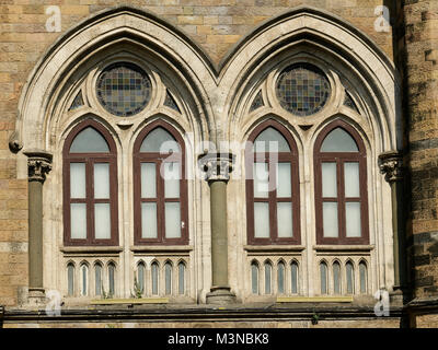 Architecture: Close up of Lancent Arched Windows with Glass Pane Stock Photo