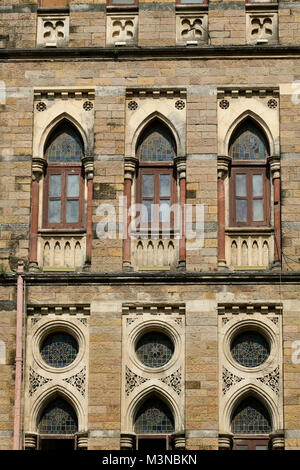 Architecture: Close up of Lancent Arched Windows with Glass Pane Stock Photo