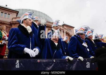 Mainz, Germany. 10th Feb, 2018. Officials from the Karneval-Club Kastel wave at the parade. Children from schools and Kindergartens in Mainz marched through Mainz in the annual Youth Carnival Parade. They were accompanied by members of the carnival guards and clubs from Mainz. Credit: Michael Debets/Pacific Press/Alamy Live News Stock Photo