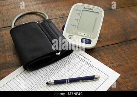 https://l450v.alamy.com/450v/m3np49/sphygmomanometer-or-blood-pressure-monitor-cuff-and-chart-ready-to-m3np49.jpg