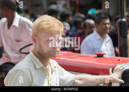 Albino man Indian hindu blonde white parade Matale Sri Lanka Stock Photo