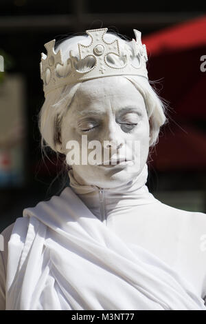 Living statue, white queen, in Montreal, province of Quebec, Canada. Stock Photo