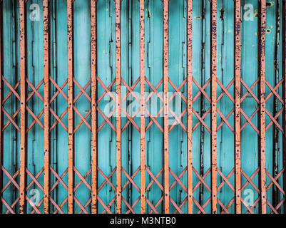 Old Vibrant Sliding Steel Gate Stock Photo