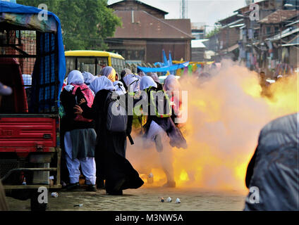 tear gas shell explodes near Kashmiri students protest, Kashmir, India, Asia Stock Photo