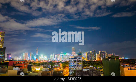 Time lapse view of Makati skyscrapers in Manila city. Skyline at night, Philippines.