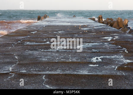 North beach on Heligoland with decayed pier Stock Photo