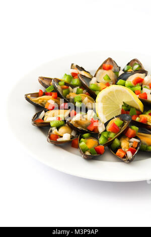 Steamed mussels with peppers and onion isolated on white background Stock Photo