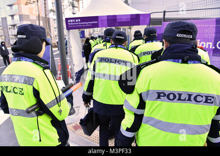 Pyeongchang, South Korea. 12th Feb, 2018. Police officers in Pyeongchang, South Korea, 12 February 2018. Credit: Peter Kneffel/dpa/Alamy Live News Stock Photo