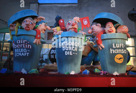 A political caricature float depicting the 'Air Berlin takeover of Lufthansa' is prepared for the Rosenmontag (Shrove Monday) carnival procession in Duesseldorf, Germany, 12 Febraury 2018. Photo: Marcel Kusch/dpa Stock Photo