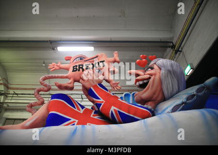 A political caricature float featuring 'Theresa May, prime minister of the United Kingdom' is prepared for the Rosenmontag (Shrove Monday) carnival procession in Duesseldorf, Germany, 12 Febraury 2018. Photo: Marcel Kusch/dpa Stock Photo