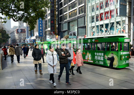 Shanghai, China. 12th February 2018. Most important holiday in China: Chinese New Year, Year of Dog. Chinese families enjoying shopping in Nanjing Road on 12th February. Credit: Bartlomiej Magierowski/Alamy Live News Stock Photo