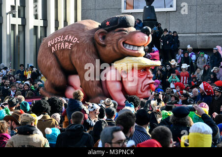 Duesseldorf, Germany. 12th February, 2018. Carneval, Rose Monday Parade: US President Donald Trump on a float during the Rose Monday Parade in Duesseldorf, Russian affair. Credit: UKraft/Alamy Live News Stock Photo