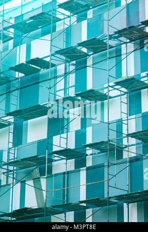 Scaffolding with green mesh on building Warwick Warwickshire England UK ...