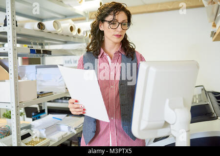 Manager Operating Printing Press Stock Photo