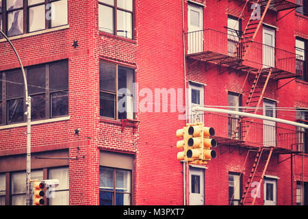 New York City traffic lights with building on background , color toned picture, USA.