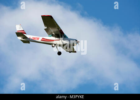 Cessna 152 approaching Wellesbourne Airfield, Warwickshire, UK (G-OWOW) Stock Photo